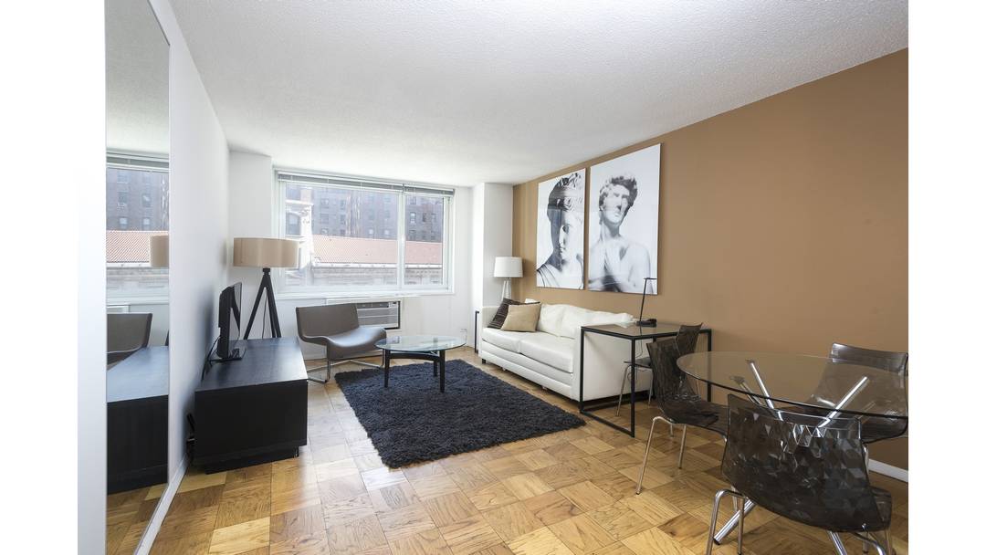 Spacious bright East facing one bedroom, one bathroom apartment in a luxury full service building located in Midtown West.