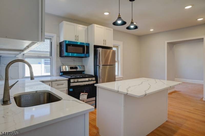 Best Location ! Spacious superbly located, two story townhouse style duplex at the heart of Summit.