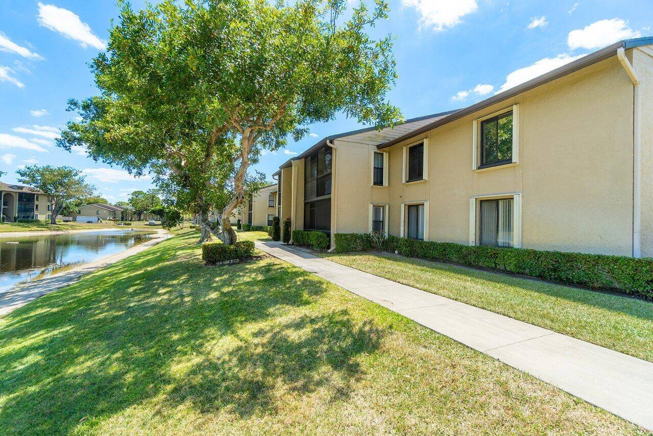 ALL AGES WELCOME ! Beautiful 1st floor corner unit with lake view enclosed patio.