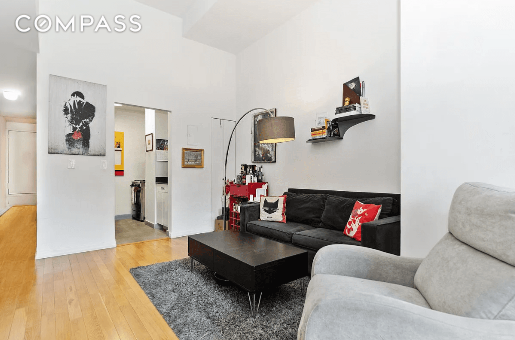 This spacious loft apartment has 14 foot ceilings and an extraordinary layout.