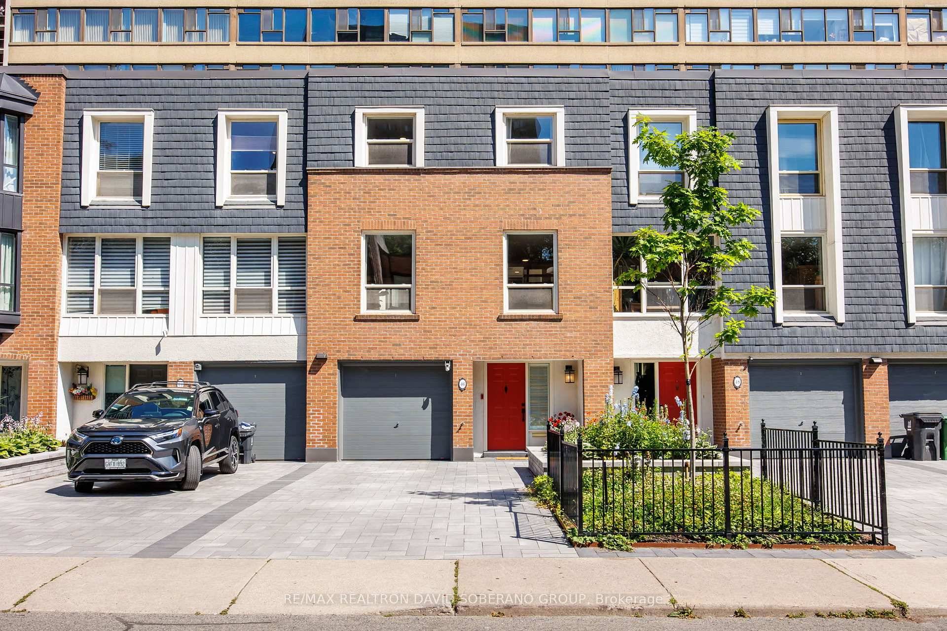 Discover this stunningly redesigned condo townhome, perfectly positioned on a quiet crescent just steps to Yonge and College.