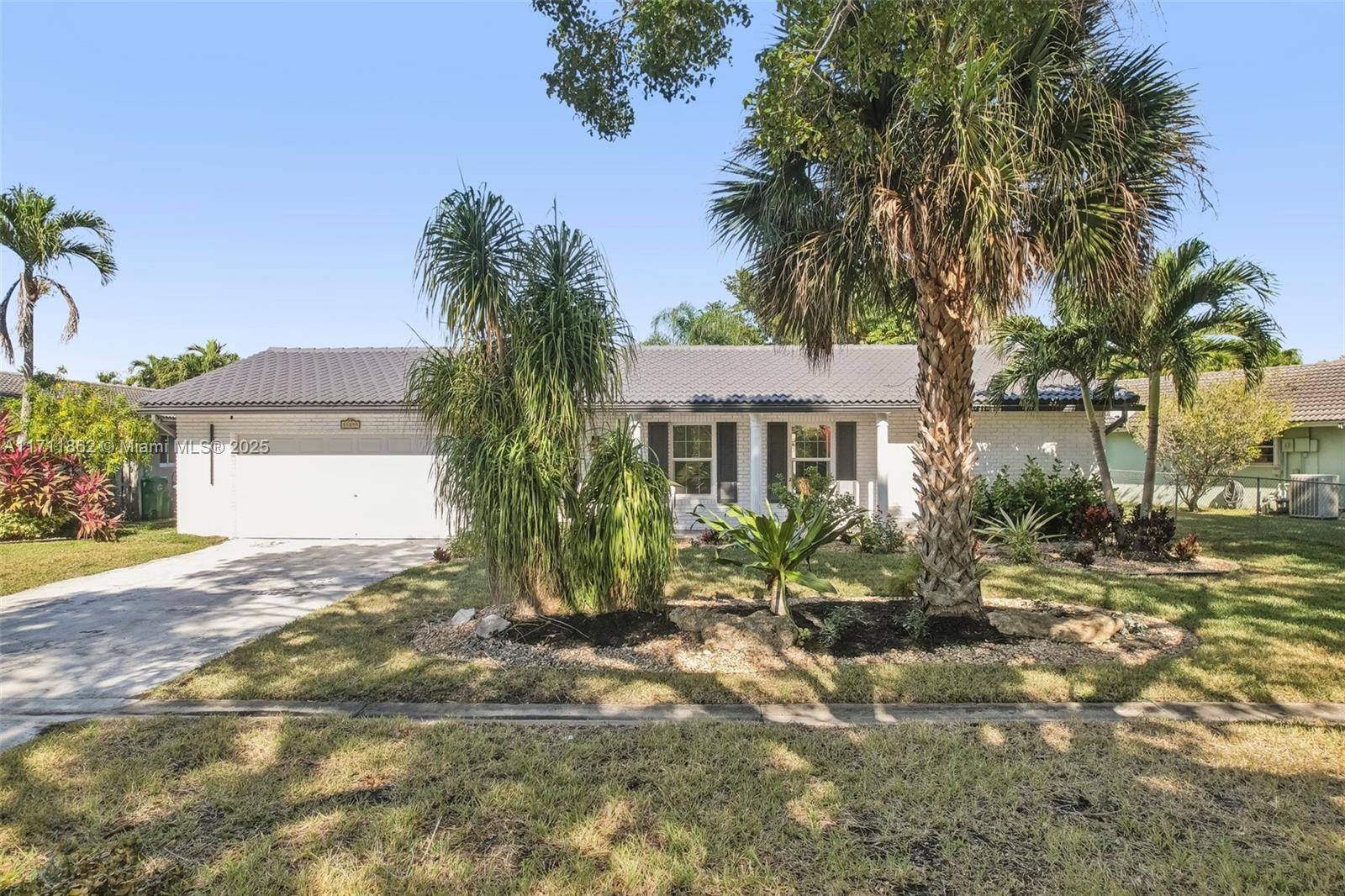 Welcome to your dream home in a desirable NO HOA neighborhood of Coral Springs !