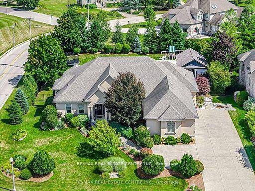 Experience unparalleled comfort and luxury in this stately custom built executive bungalow, this rare gem spans over 6, 600 sq.