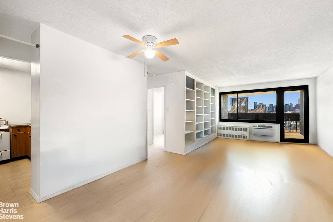 Epic sweeping uninterrupted East River and Brooklyn Bridge views !