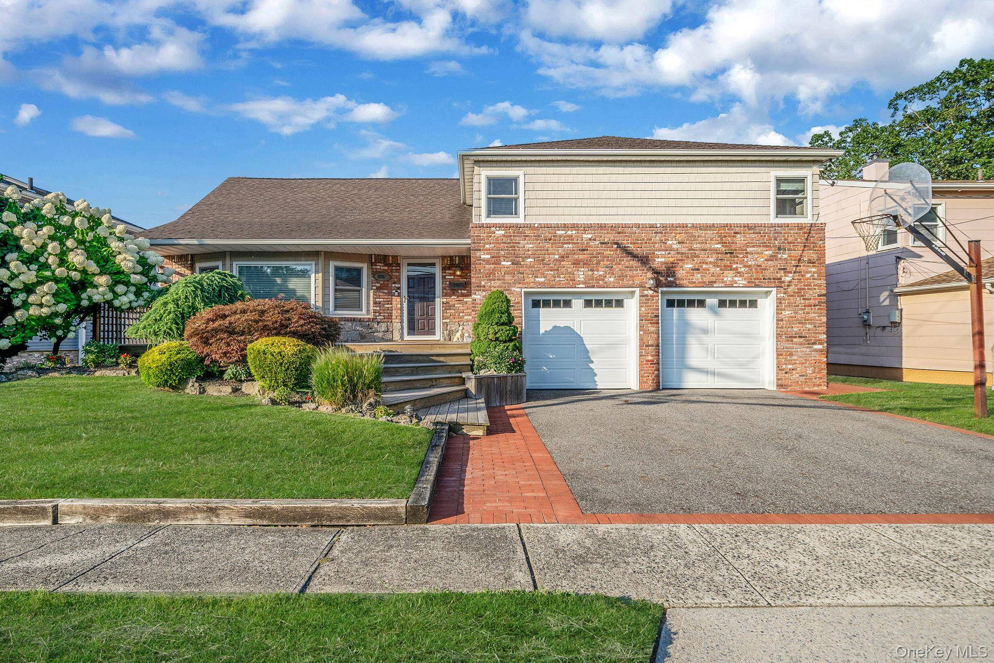 Welcome to 3357 Poplar St a beautifully updated residence blending modern luxury with timeless comfort.