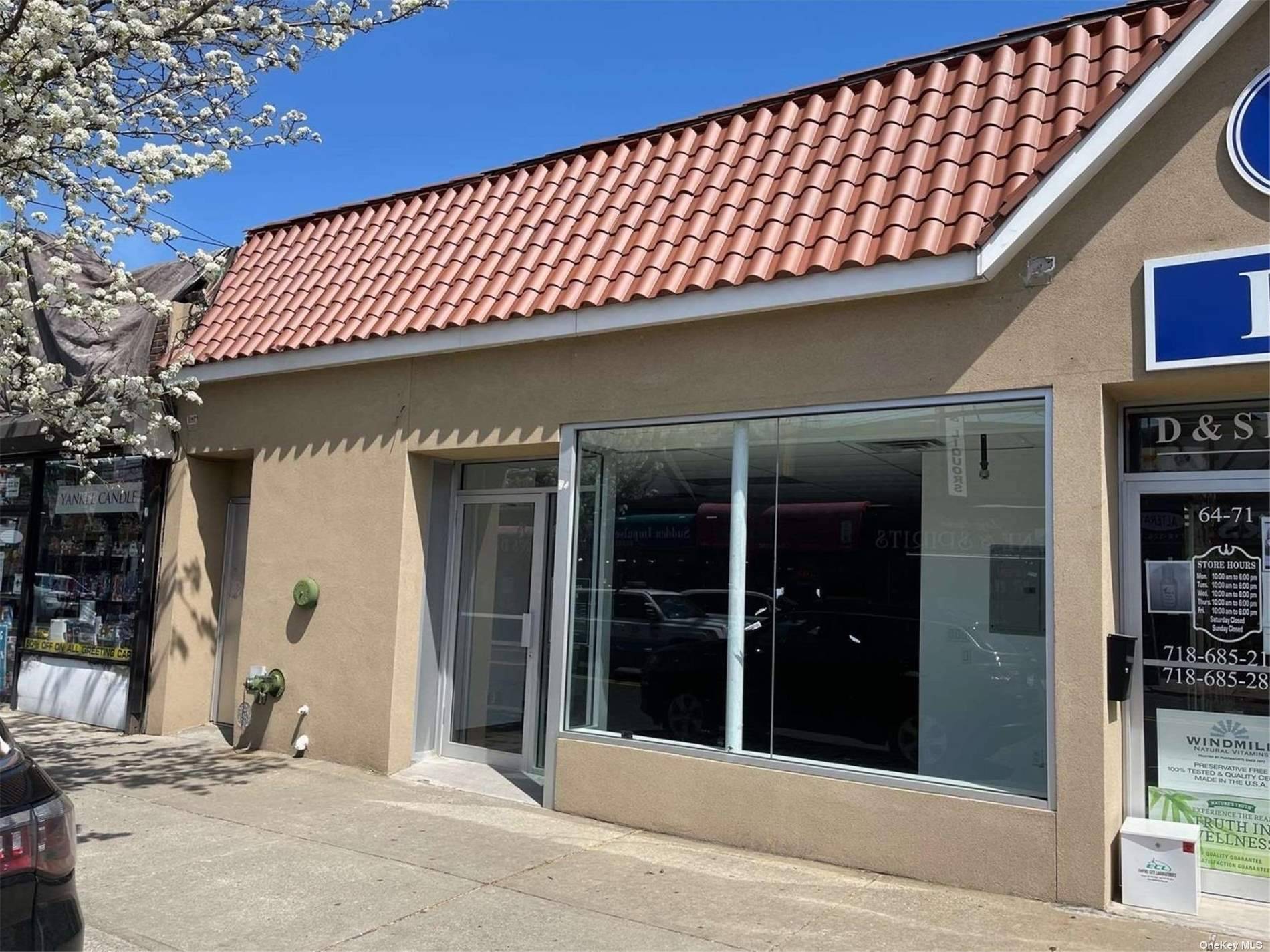Store front for rent in the heart of Middle Village.