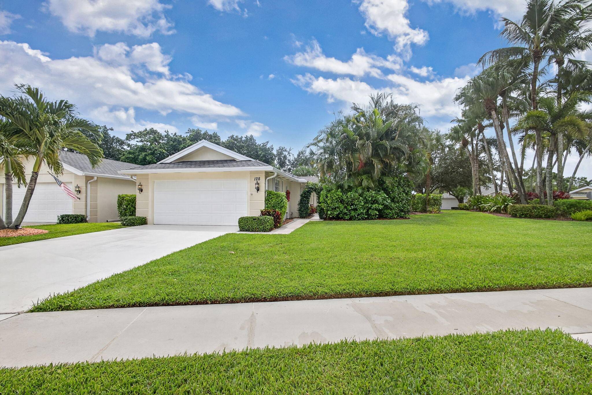 RARE OPPORTUNITY to own a beautifully updated DiVosta Capri model on one of the largest lots in Greenbrier at the Indian Creek golf course community.