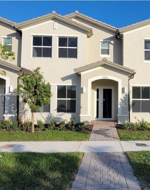 Located in the desirable Harmony Parc community in Homestead, this modern townhouse built in 2023 offers contemporary design, functional spaces, and comfortable living.