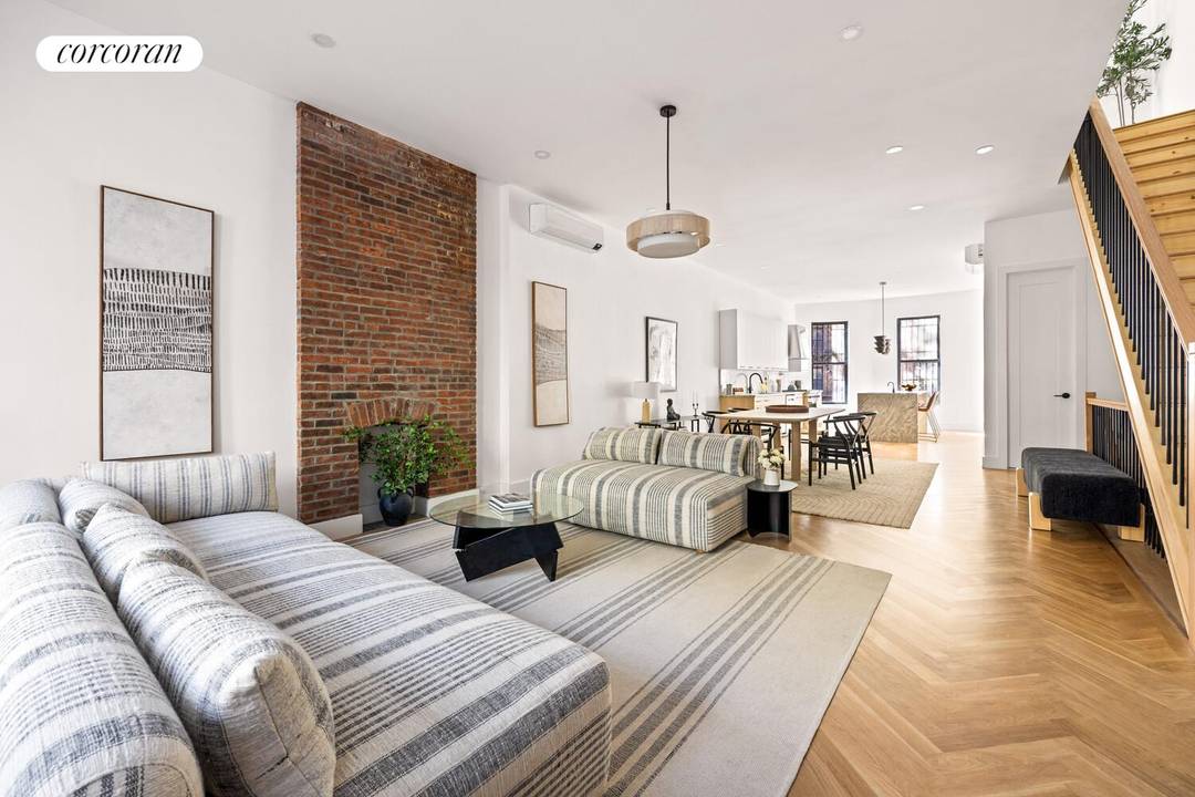 Set on a rare over 20 foot wide footprint and spanning approximately 4, 482 square feet, this beautifully reimagined two family townhouse offers exceptional scale, flexibility, and architectural character in ...