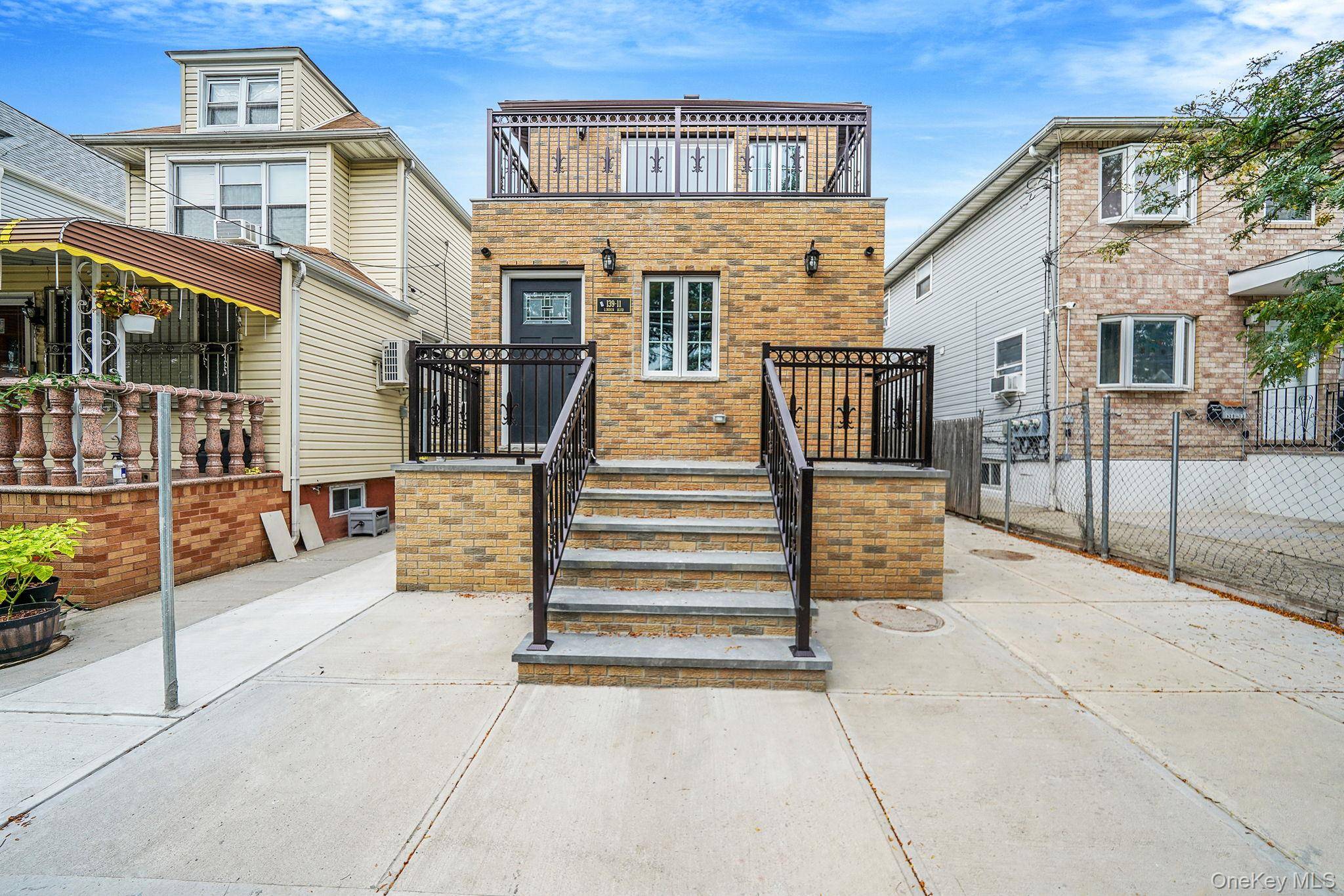 Welcome to this brand new home at 139 11 Linden Boulevard in Jamaica.
