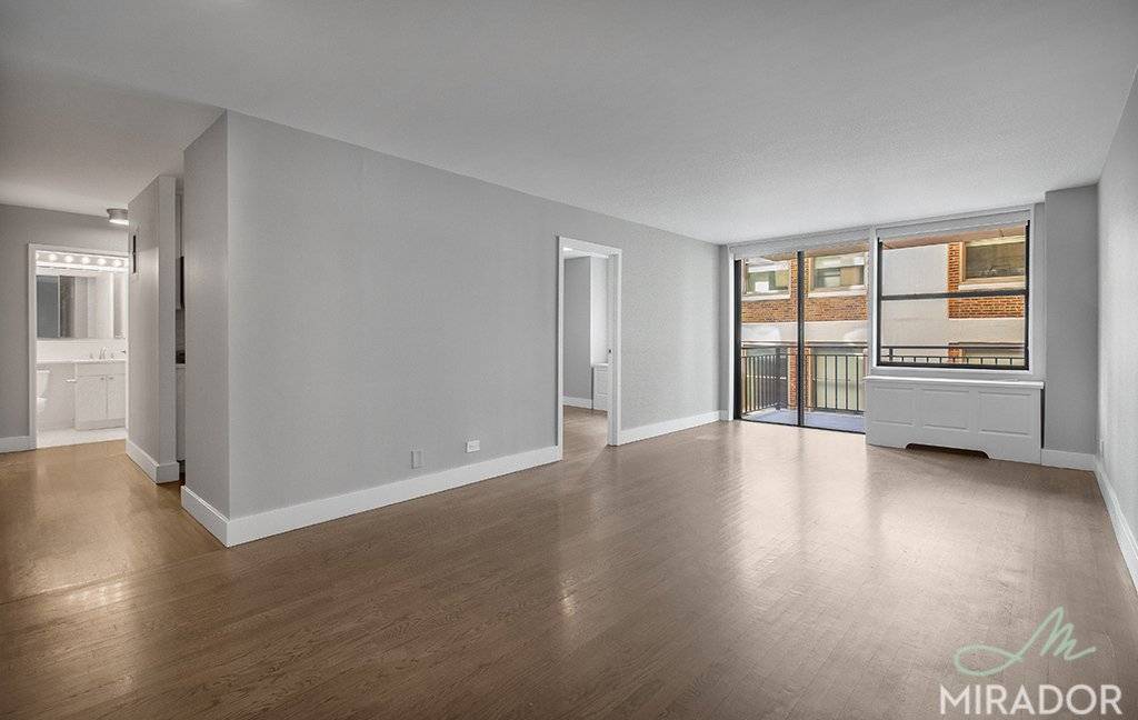 Beautiful 2 BR 1. 5 Bath corner unit on the 14th floor of New York Tower featuring a private south facing balcony, high ceilings and a large living room.