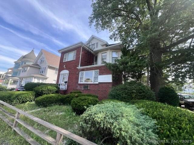 This corner lot building at 1845 Summer Street offers four total units in a prime, high visibility Stamford location.