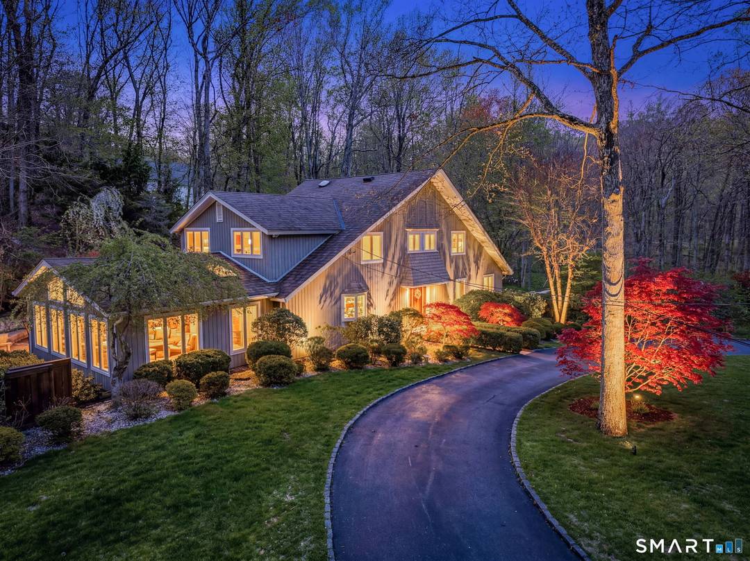 Set on over two private acres along the Wilton Weston border, this architecturally distinct Contemporary offers a compelling blend of design, privacy setting.