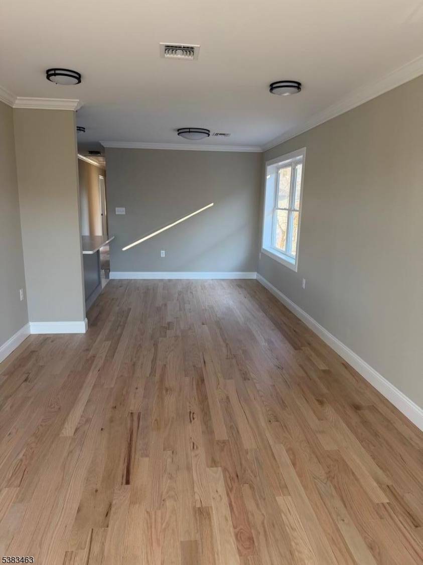 Brand new construction 2 family with first unit having 3 bedrooms and 3 full bathrooms.