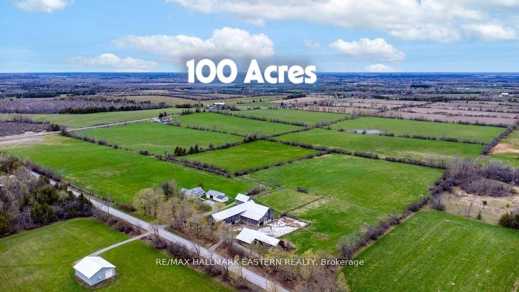 100 Acre farm on the edge of Peterborough with 2 paved road frontages.