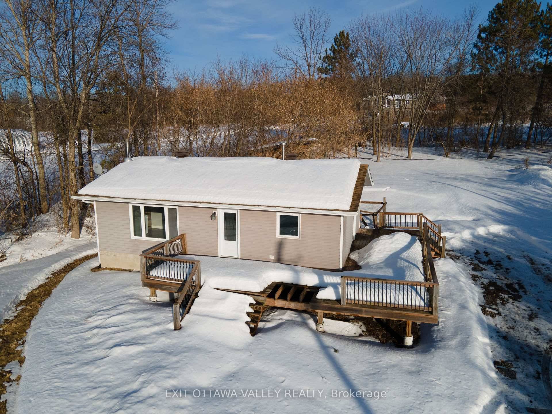 Imagine coming home to breathtaking views of the lake, enjoying peaceful sunsets from your front deck.