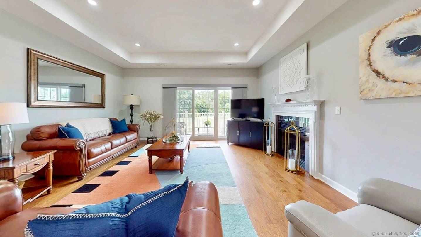 Located in the Mount Carmel section of Hamden, this lovely, spacious 2 bedroom, 2 bath ranch style end unit condominium features a unique open floor plan, 9ft ceilings, and over ...