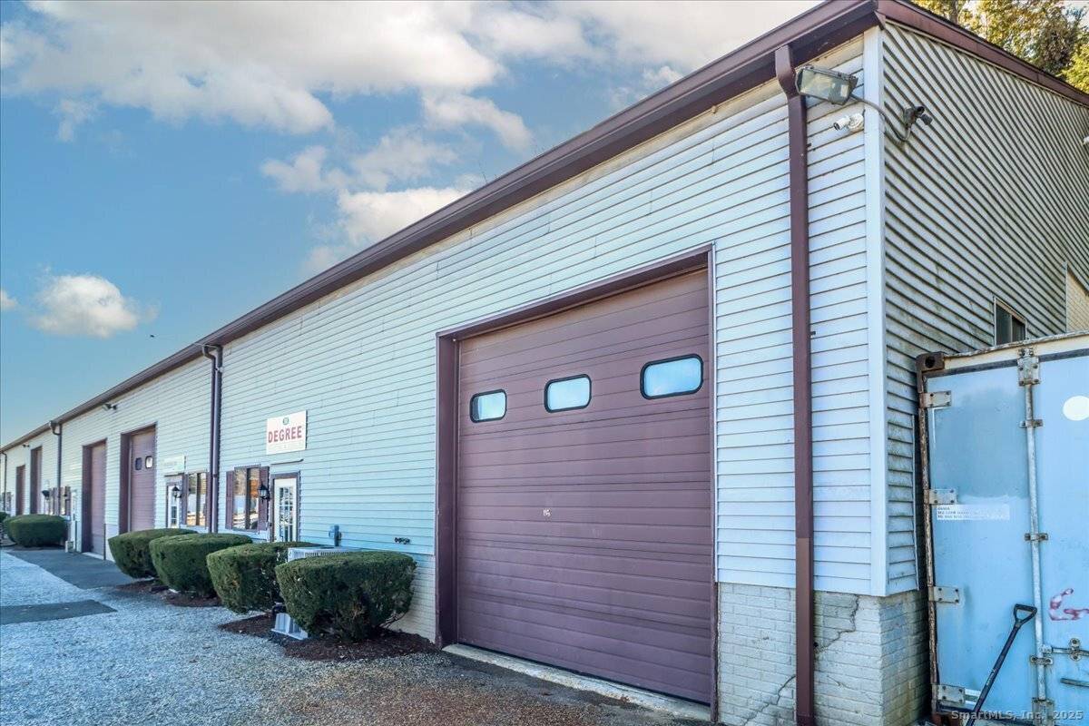 Exceptional opportunity to own a versatile industrial condo located in the desirable South End Plaza.