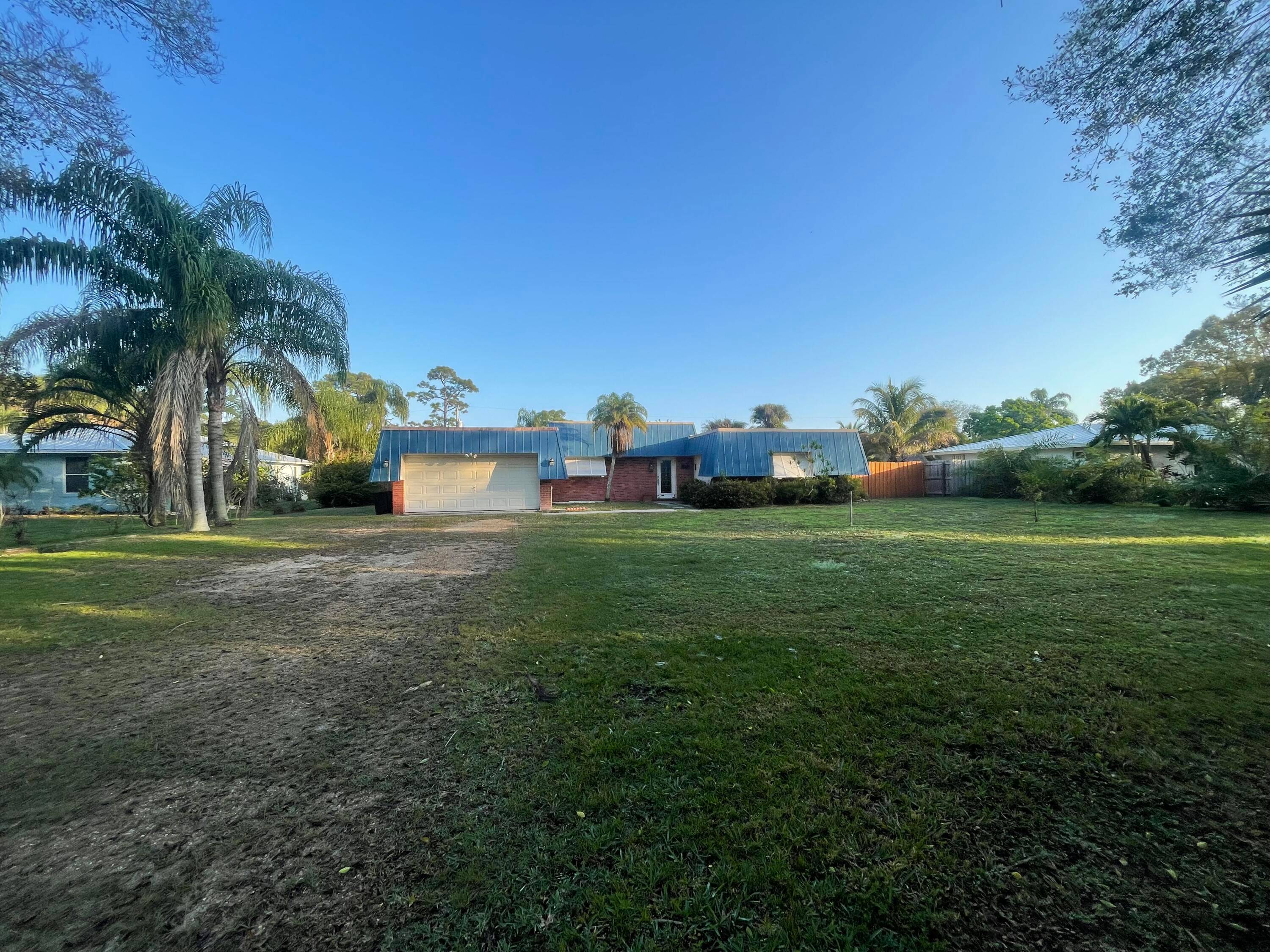 This charming 3 bed, 3 bath CBS pool home with a 2 car garage offers an unbeatable blend of location, space, and potential !