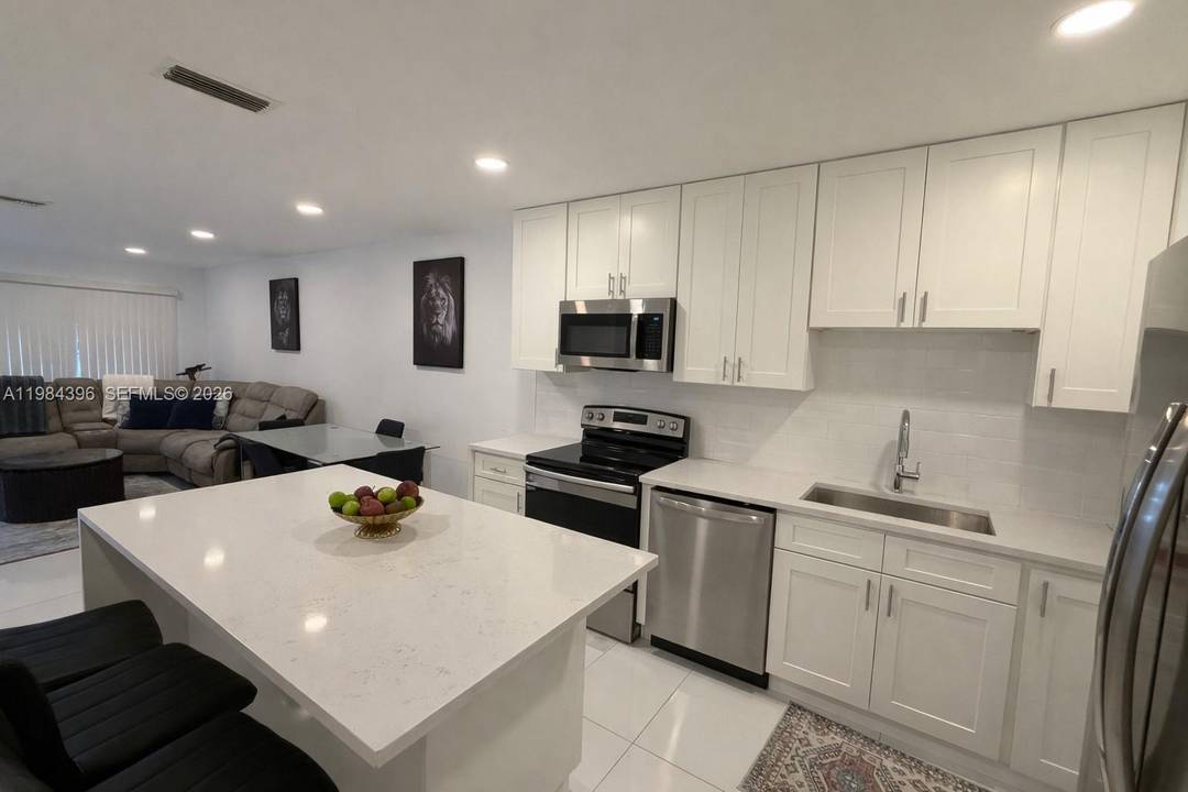 Fully renovated duplex just 1 mile from the beach in desirable Deerfield Beach.