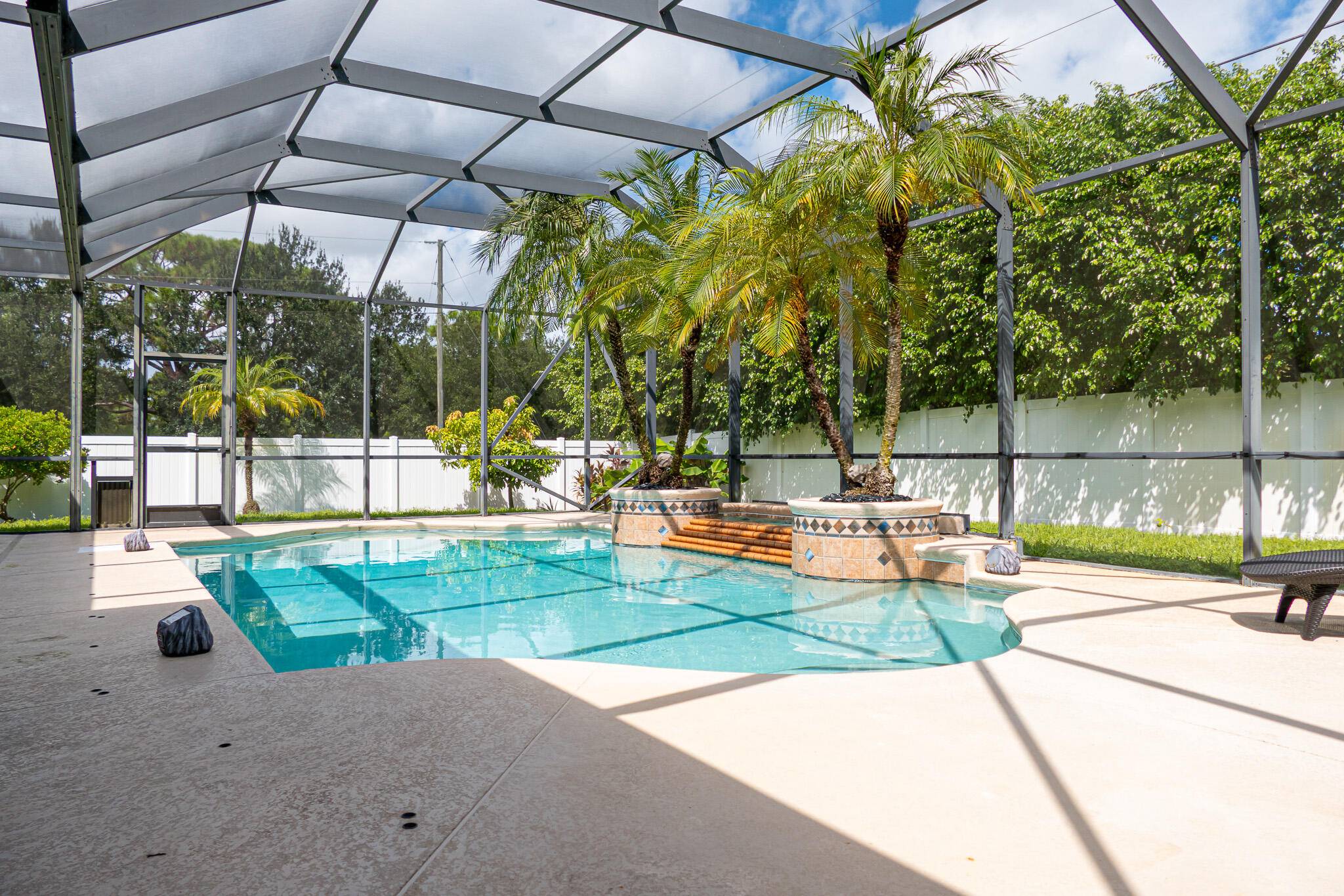 Welcome to 2443 SE Tracy Avenue, a stunning oasis in the heart of Port St.
