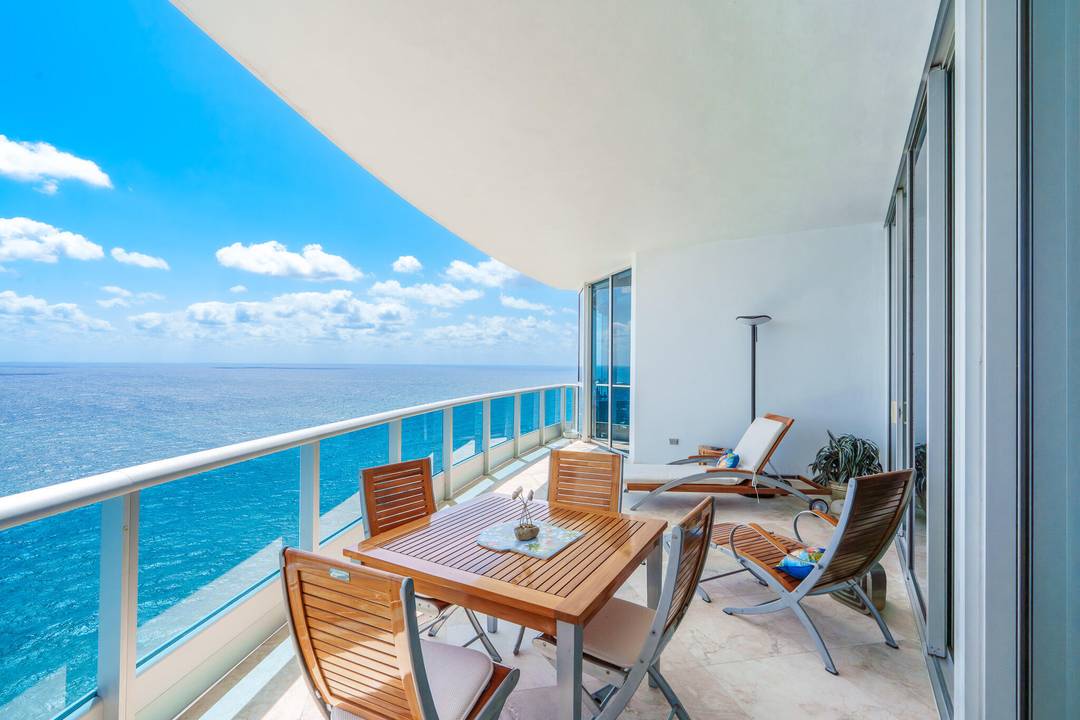 Oceanfront Penthouse ! Sophisticated coastal living in this 3 bed, 4.