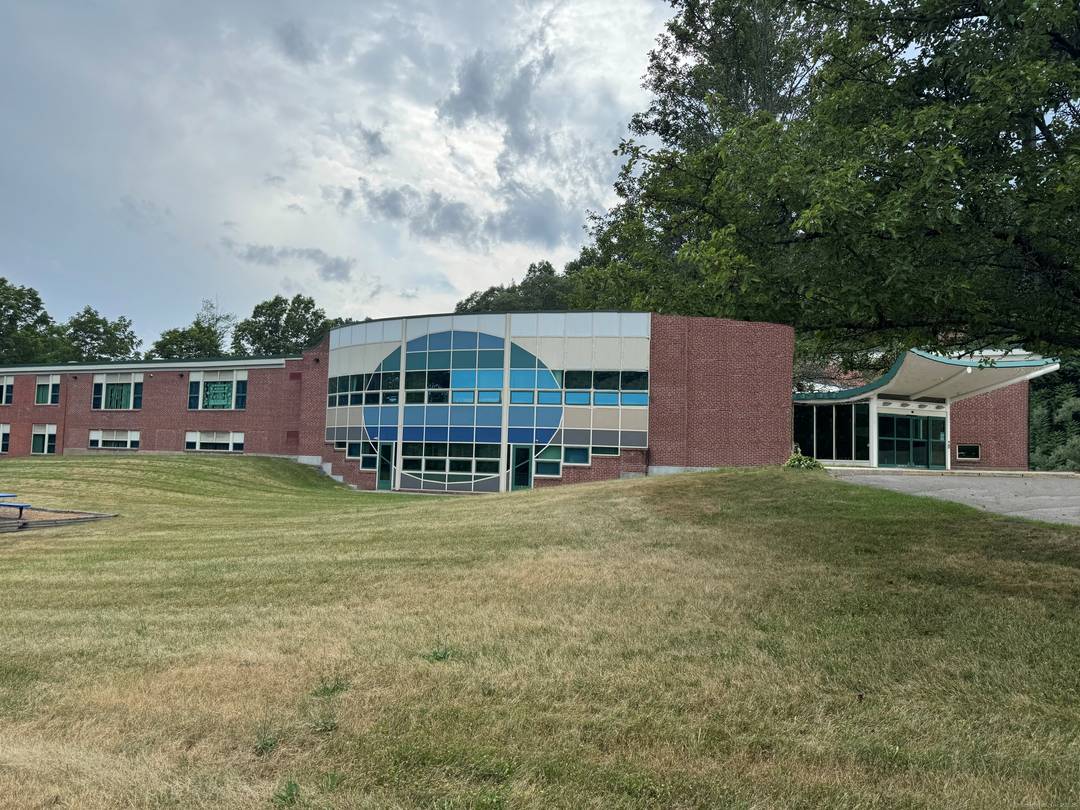 37, 769 SF two story building on a well manicured 5.