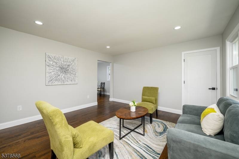 This newly renovated ranch house, with a new kitchen and baths, a lovely property setting on a quiet street is ready for new owners.