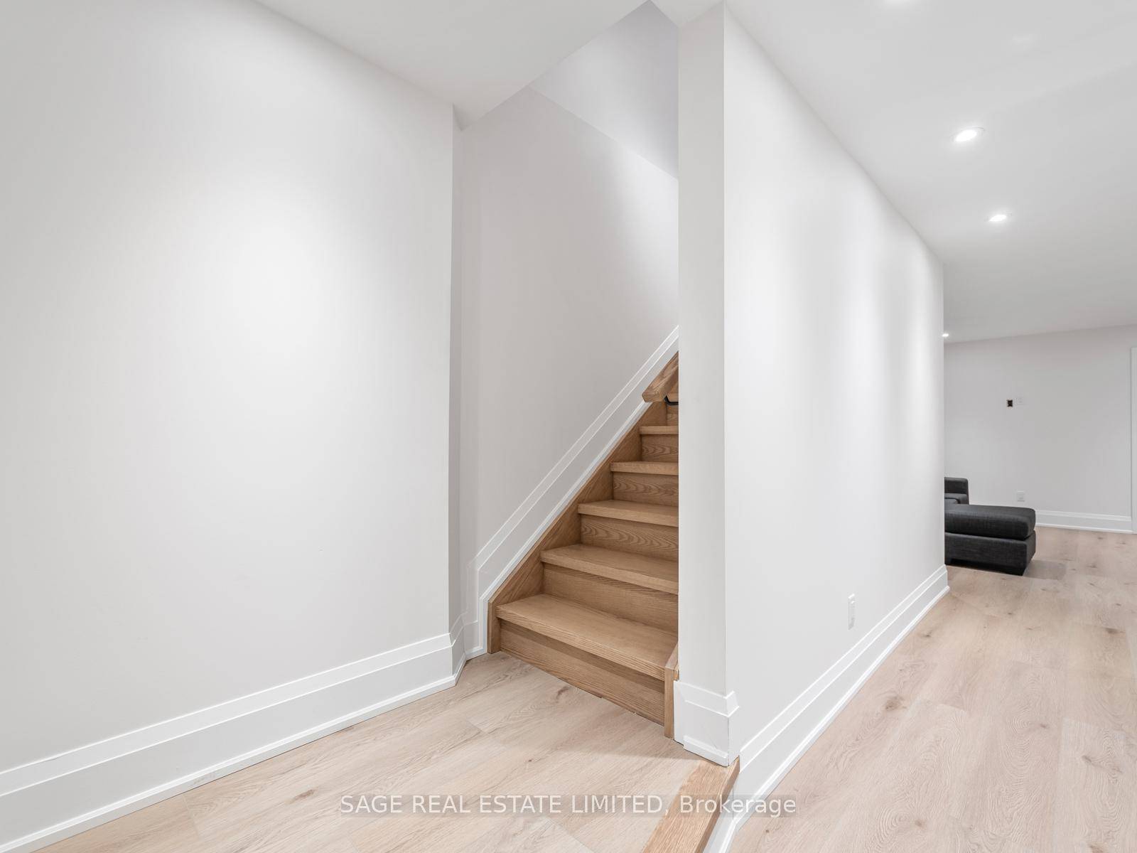 Welcome to 64 Gwynne Ave, a fully renovated two bedroom furnished lower level apartment that perfectly blends modern living with artistic flair.