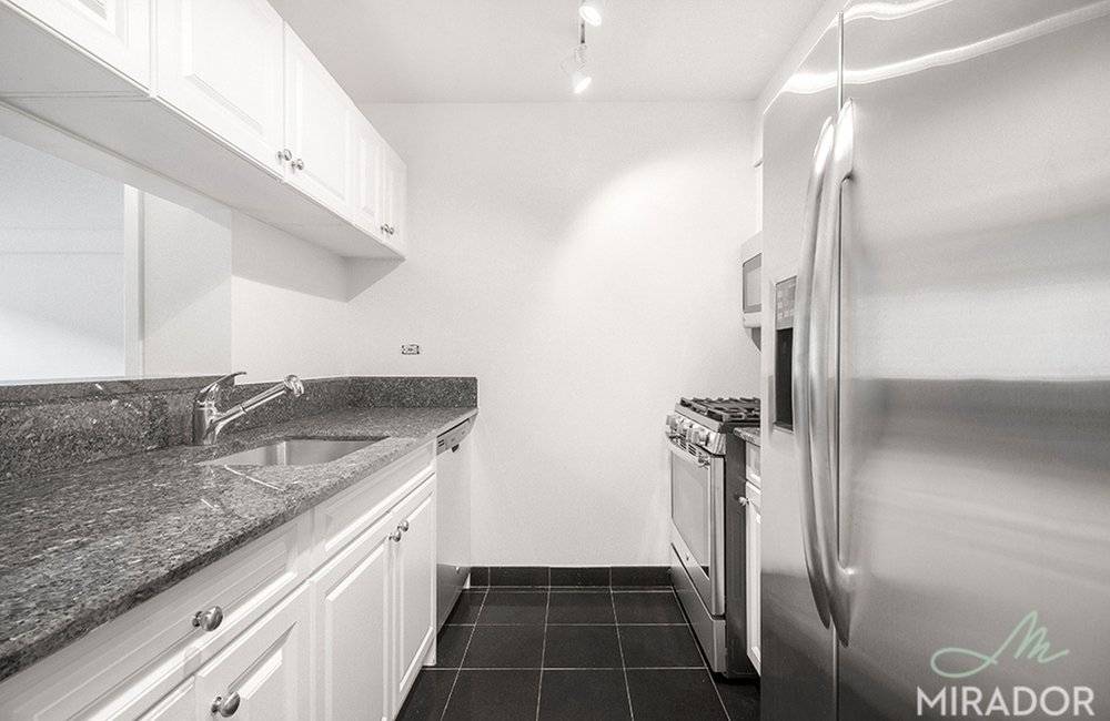 Beautifully renovated two bedroom apartment with two full marble bathrooms now available at The Caroline.