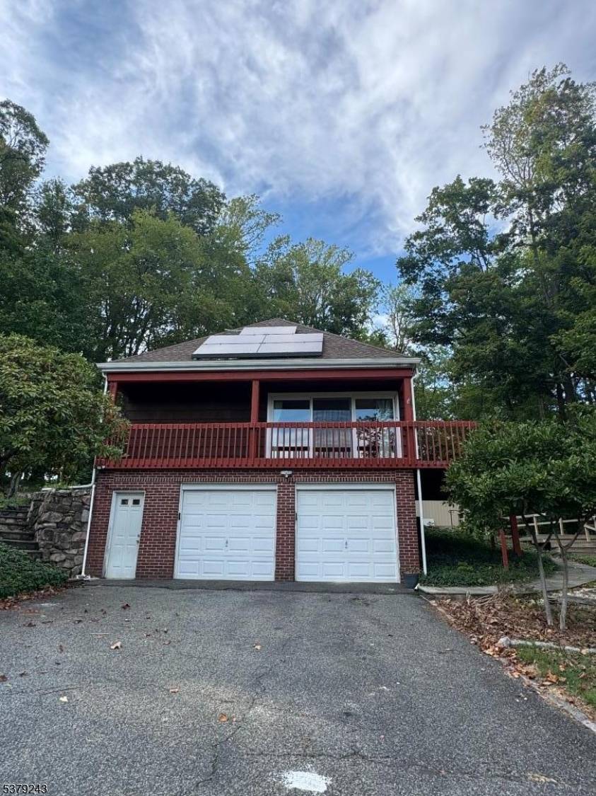 4 bedrooms, 3 and half bath home set on a one acre lot with gorgeous woods all around.