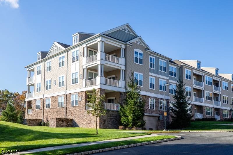 This beautifully maintained, MOVE IN READY top floor ALLAIRE model condo offers a bright and inviting open floor plan in one of the area's most sought after active adult 55 ...