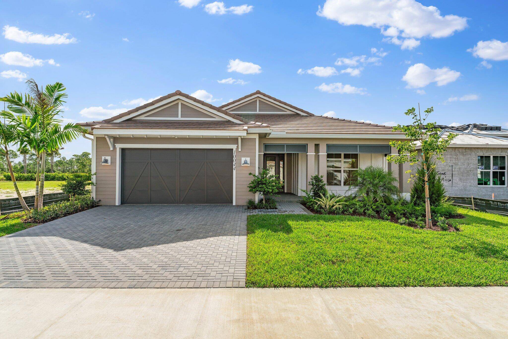 Brand new, never lived in extended Isabella Coastal model built by Toll Brothers is ready for immediate occupancy and enjoyment !
