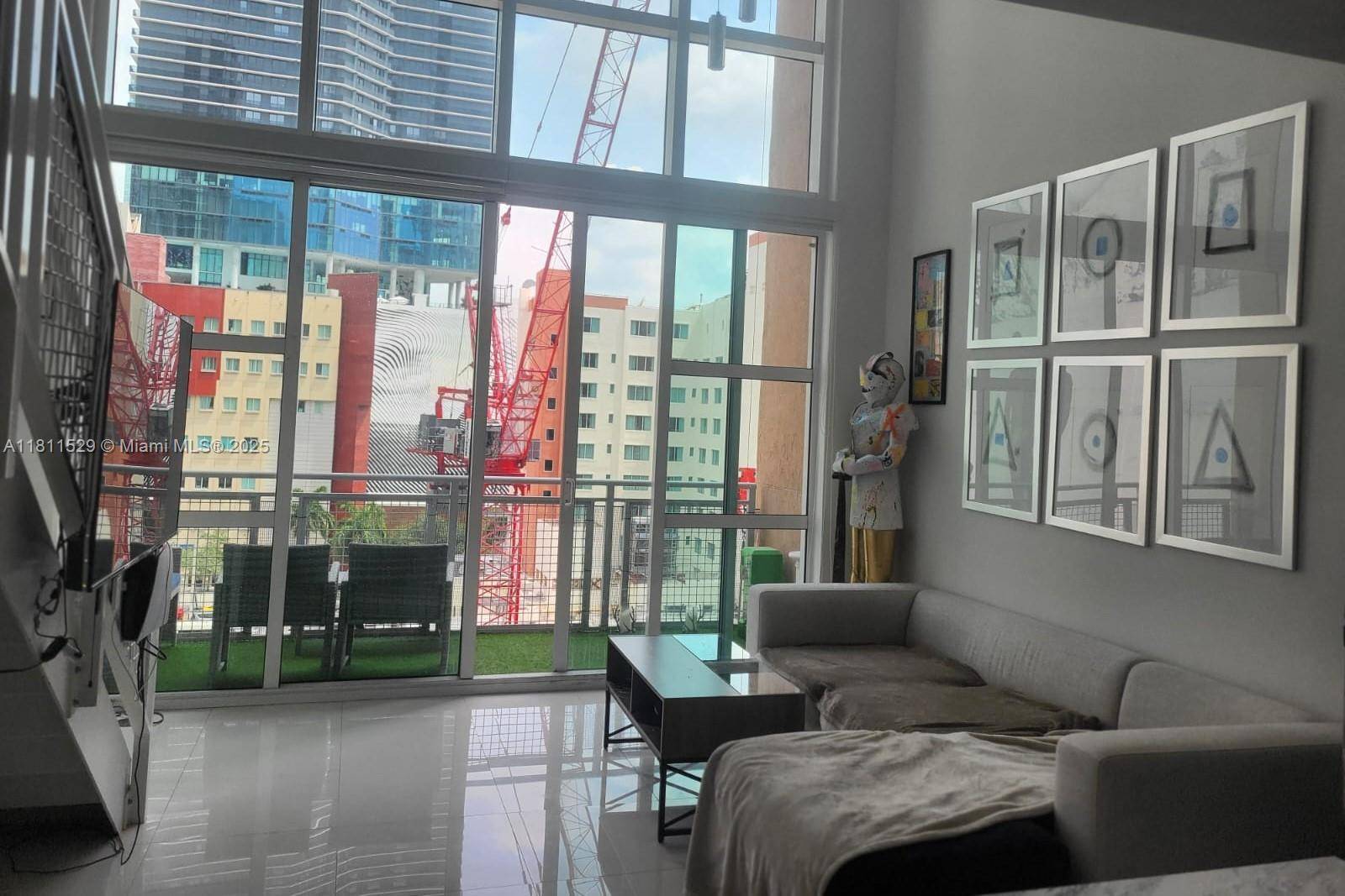Very nice two story loft ; 1 Bedroom, 1 Full Bath upstairs 1 2 Bath downstairs with 18' floor to ceiling windows ; Lounge in the tropical pool while your ...