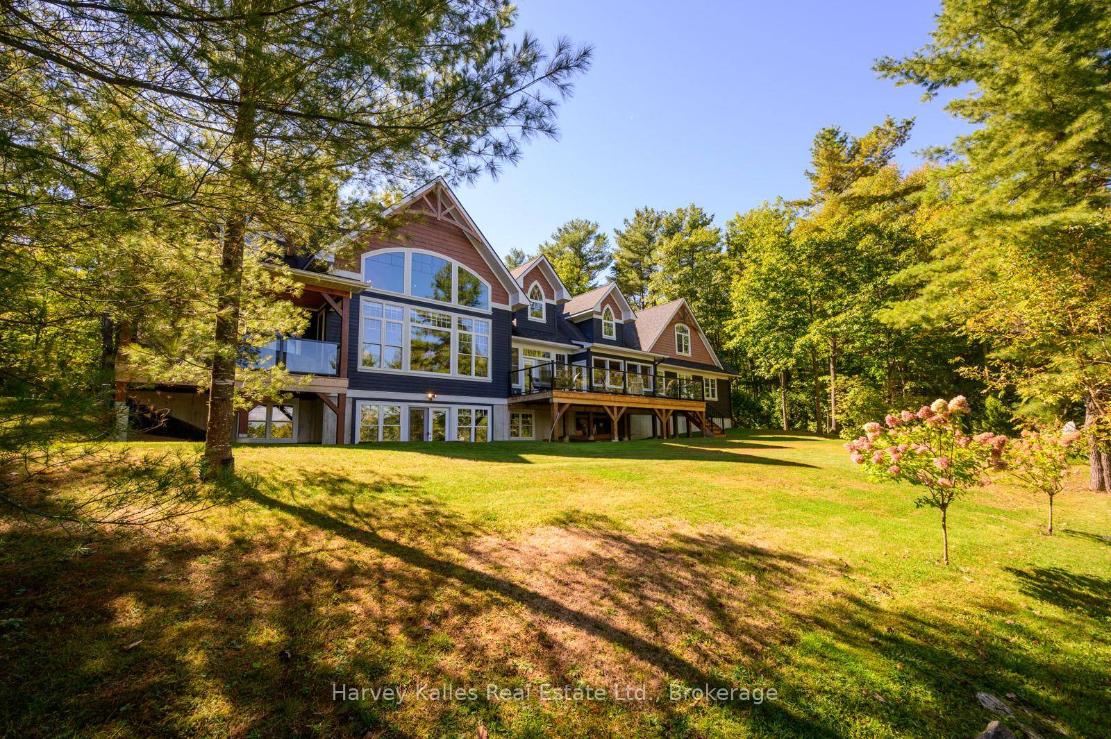 Welcome to 1045 Lakeshore Drive an exceptional waterfront retreat on Lake Muskoka that defines luxury, serenity and expansive living.