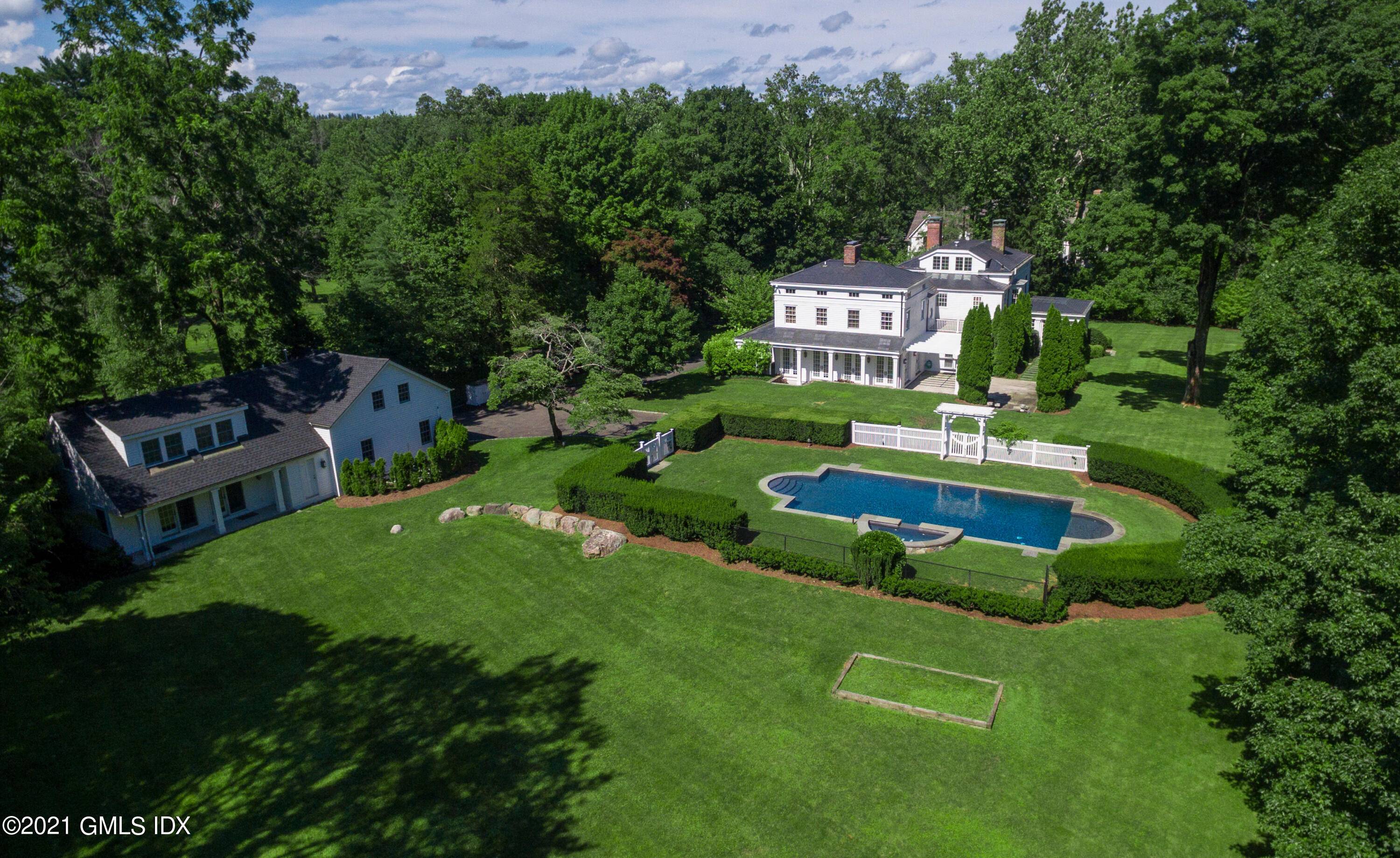 Picturesque 1. 59 gated acres w level lush backyard is an idyllic backdrop for this impressive, updated 6 bedroom home, stone terrace with pergola pool, carriage house w 2nd floor ...