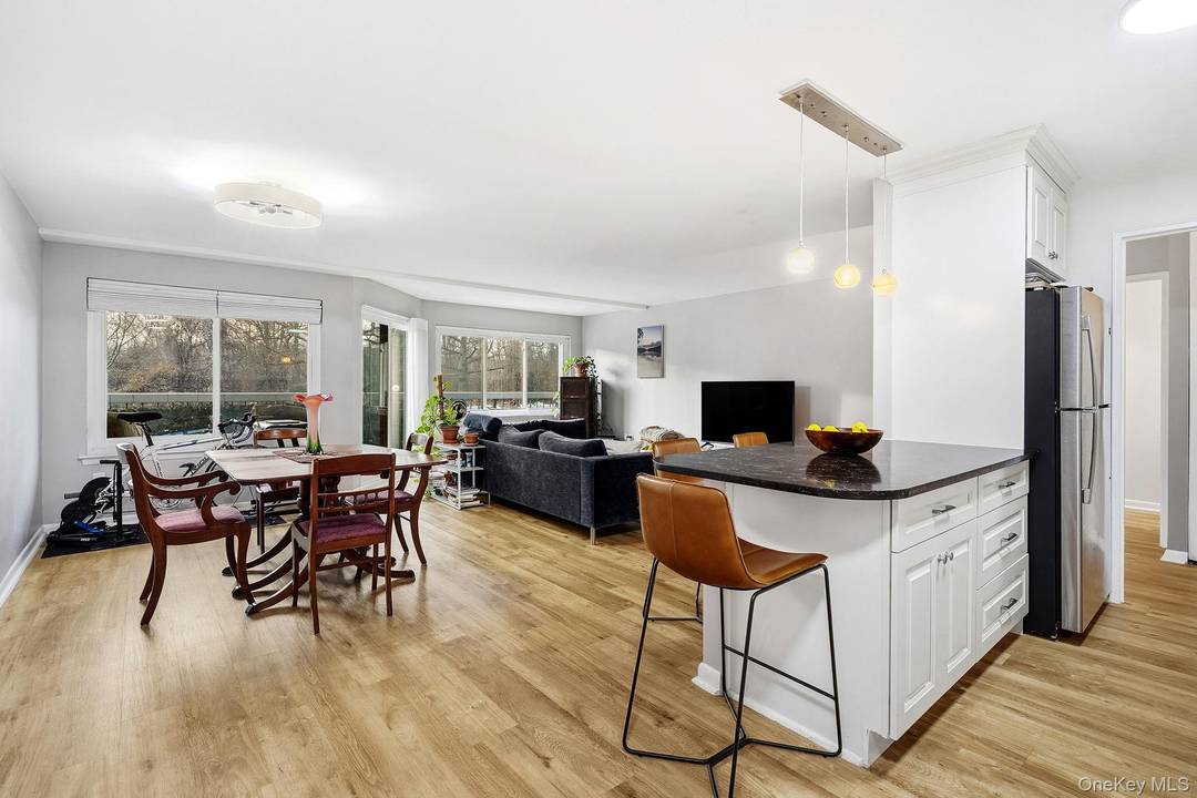 This 1 bedroom condo with a balcony is move in ready, with it's modern open concept living, dining, and kitchen area is perfect for entertaining.