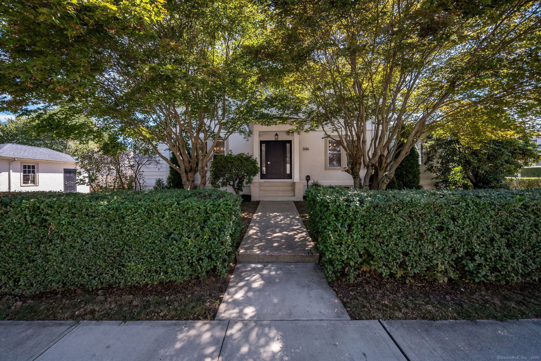 Experience the perfect blend of Colonial elegance and modern comfort at 546 Ocean Avenue.