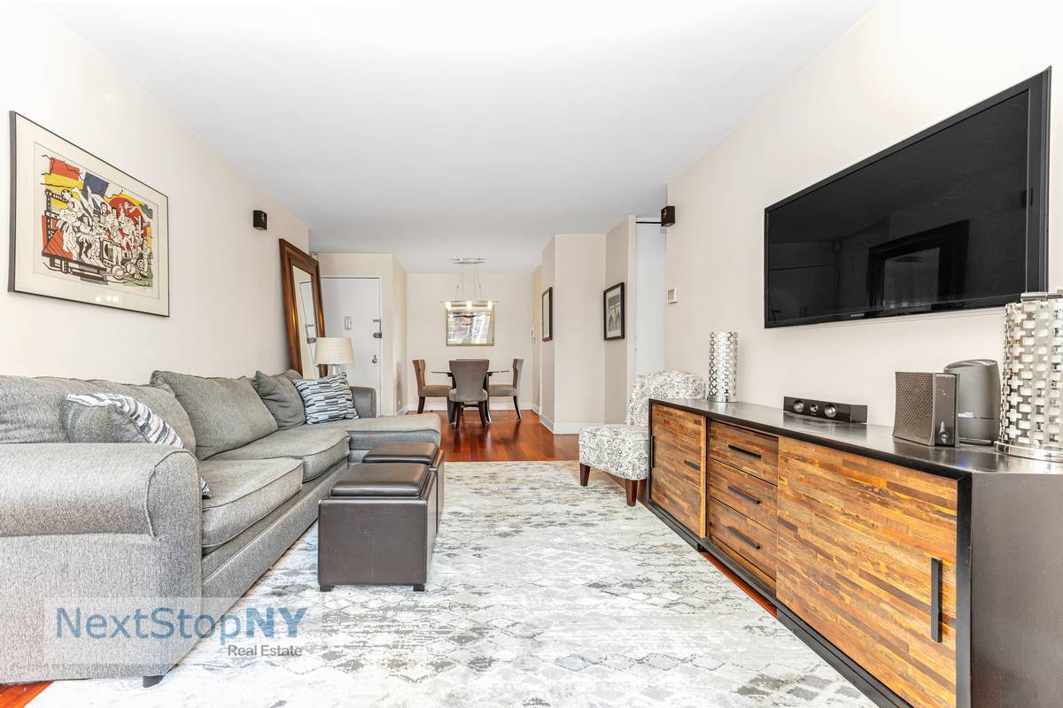 This thoughtfully reimagined one bedroom apartment has been meticulously renovated, featuring elegant wood flooring throughout.