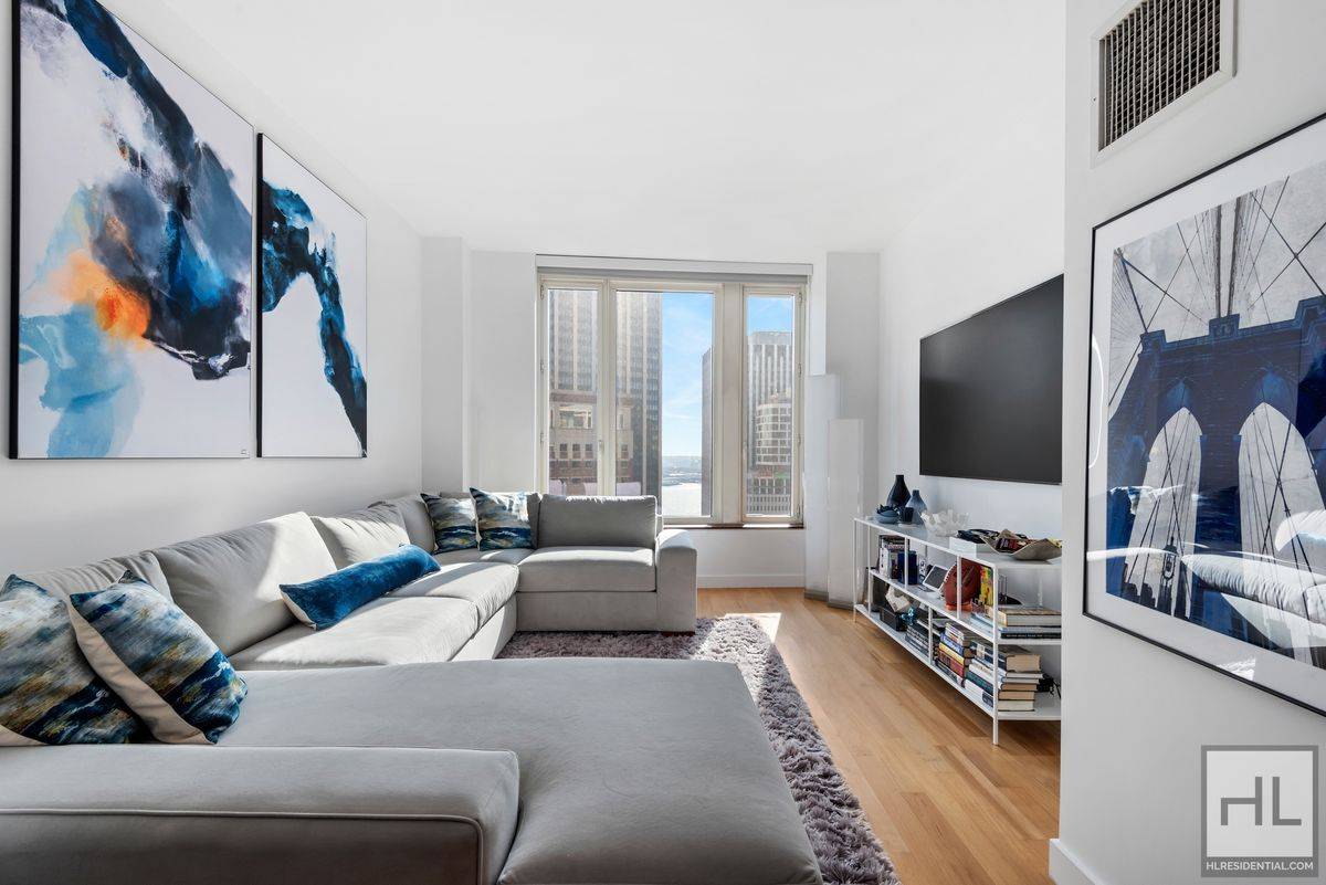 This stunning one bedroom, one bathroom residence spans 832 square feet, offering open downtown and river views.