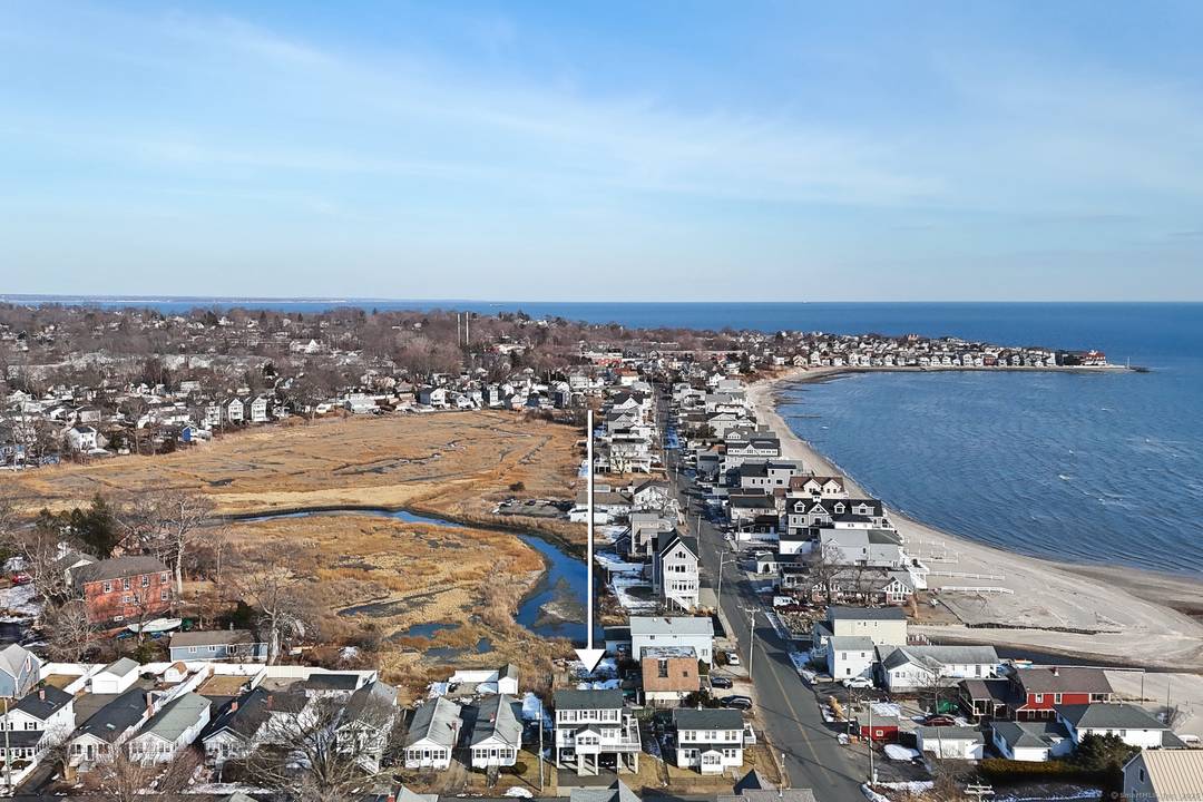 Don't miss this rare opportunity to live across from the water !