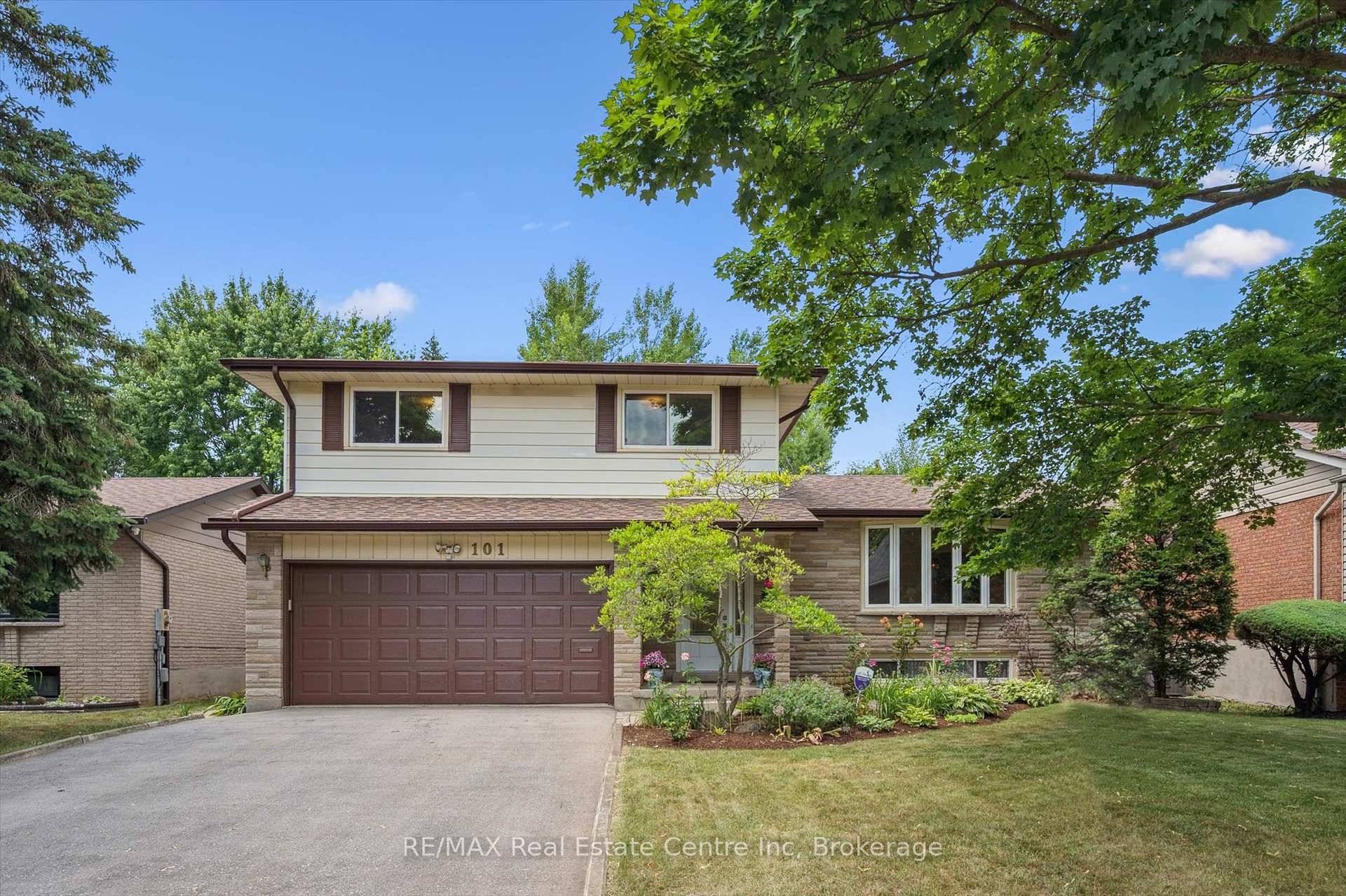 Large family home in one of Guelph's most sought after mature neighbourhoods with LEGAL 2 bed apartment !
