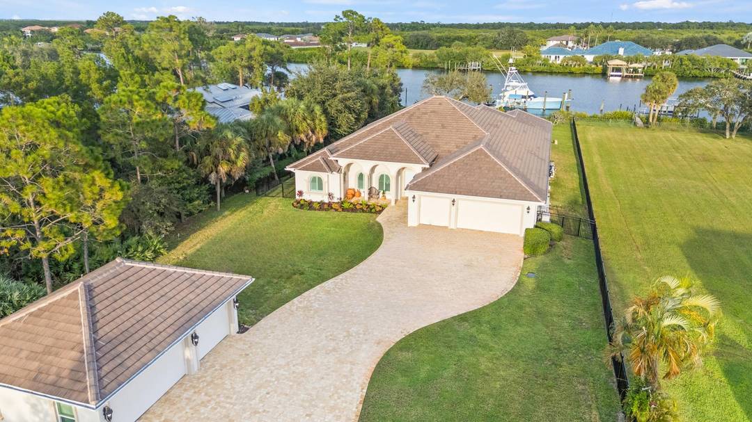 This architectural showpiece of coastal waterfront living delivers secure yacht ownership with a hurricane hole rated aprox 70' slip, deepwater ocean access, and over 1 acre in Vikings Lookout.