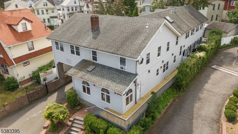 Prime in town office building with B2 zoning, allowing for both commercial and residential use.