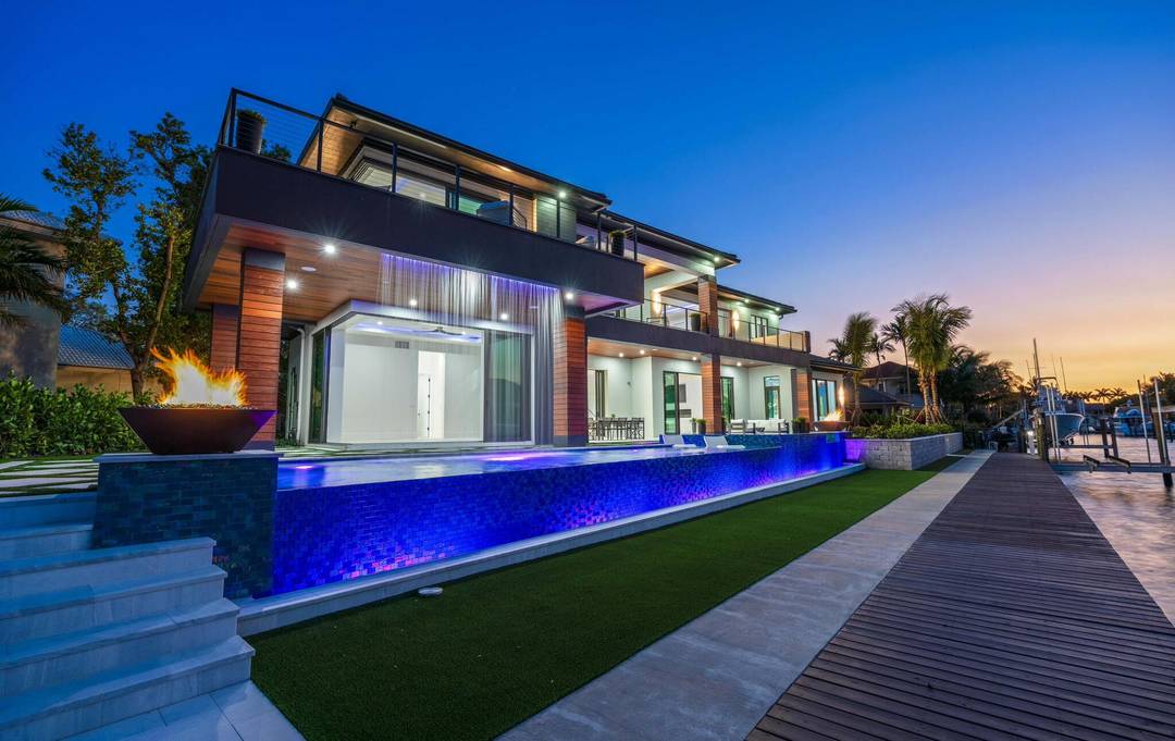 Welcome to 107 Bowsprit Dr, a waterfront masterpiece in a very highly desirable pocket of North Palm Beach !