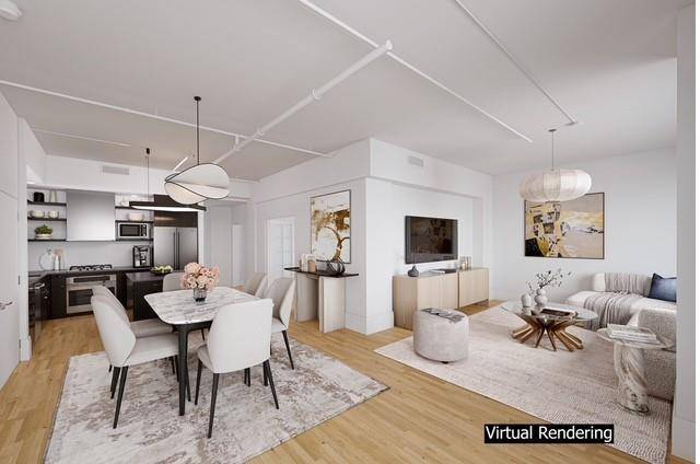 Settle into the comfort of this expansive three bedroom, two bathroom, pin drop quiet loft nestled in the Financial District.