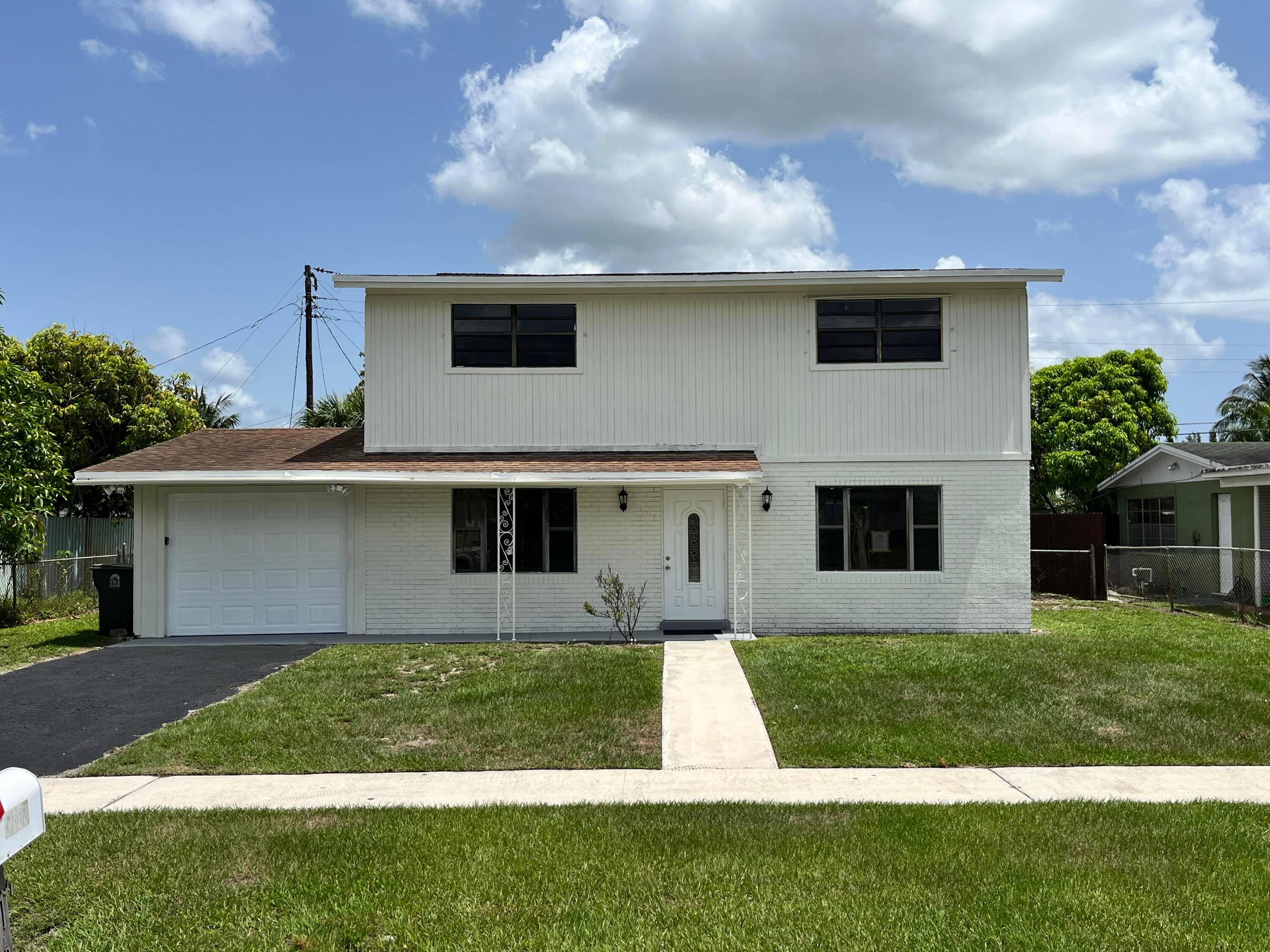Recently renovated home with tile flooring on the first floor and laminated flooring on the second floor.