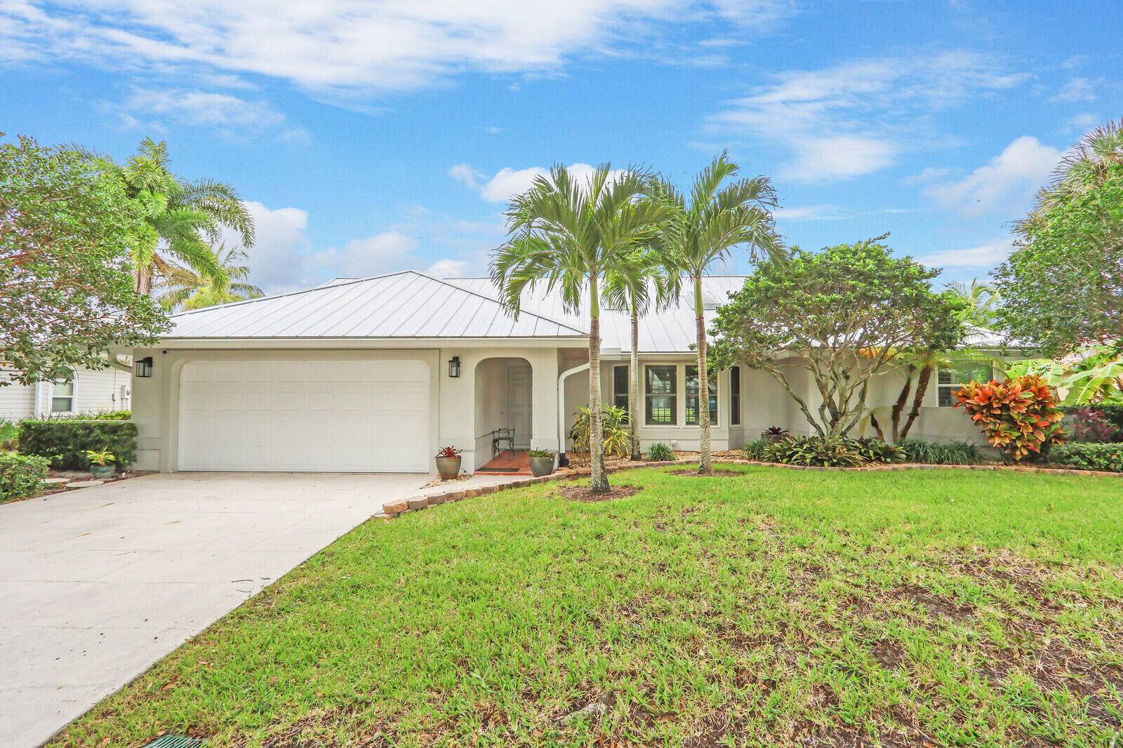 Welcome to your new home in one of Jupiter's most sought after neighborhoods The Shores.