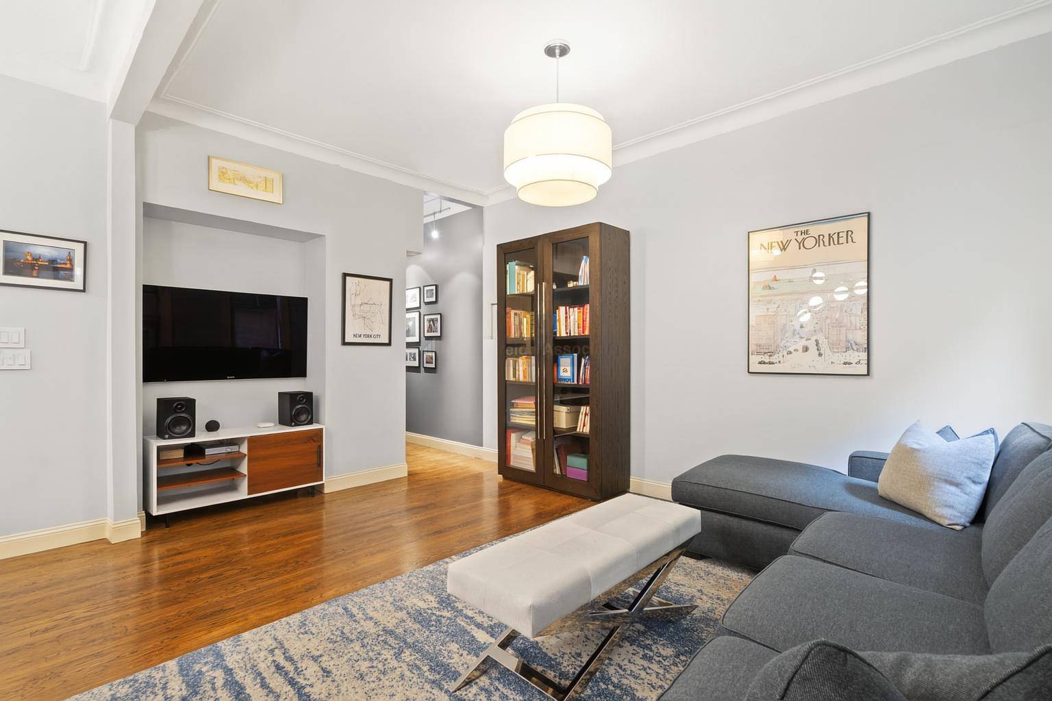 Enter the home via a classic deep entry hall that is a gallery waiting for your art and photos.