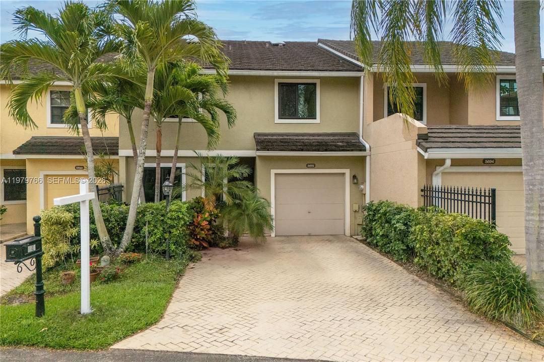 Rare opportunity to own a beautifully upgraded Boca Raton townhome with stunning golf course and canal views.